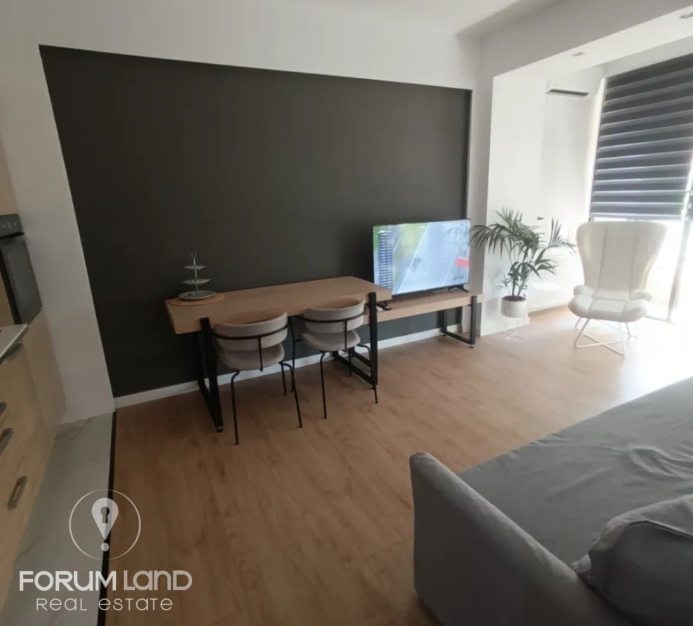 Forumland Real Estate, Living Room and Kitchen