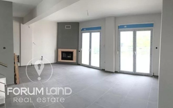 Forumland Real Estate, Living room with fireplace
